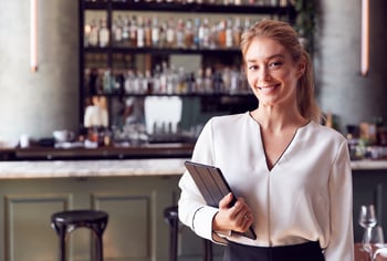 successful bar manager getting results after inventory-based incentives are hit