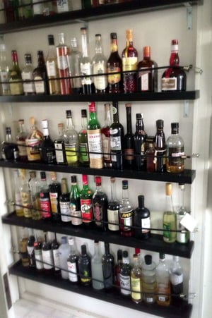 organizing your bar inventory storage area using shelves