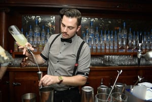 bartender pouring drinks