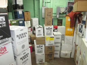 cases of liquor in a bar storeroom