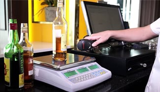 using a scale and barcode scanner to count bar inventory