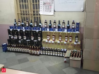 opened cases of liquor in a bar's storage room